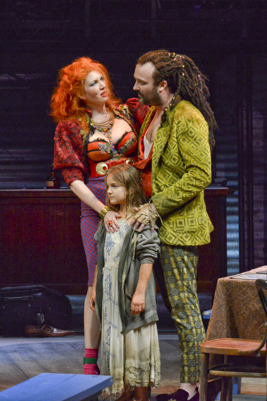 CHRISTIA MANTZKE and STEVEN MICHAEL WALTERS as the Thenardiers. JEMMA KOSANKE as Cosette