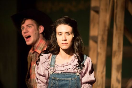 Curly (Tyler Jeffrey Adams) serenades Laurey (Alexandra Cassens)