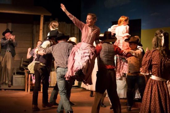 Farmers and cowmen and their gals make merry in "Oklahoma!"